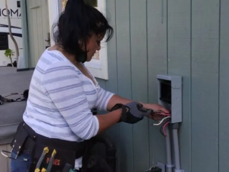 Licensed electrician wiring an exterior subpanel in Picnic Point